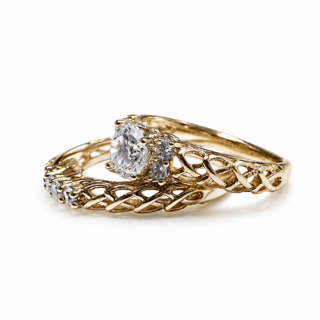 Gold ring with diamond on a white background